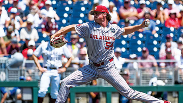 Oklahoma pitcher Jake Bennett throws another strikeout against the Texas A&M Aggies in the opening game of the College World Series in Omaha, Nebraska.