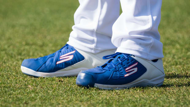 View of Los Angeles Dodgers pitcher Clayton Kershaw's blue and white Skechers cleats.