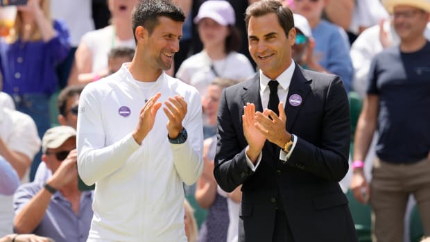 Novak Djokovic and Roger Federer at a Wimbledon ceremony.