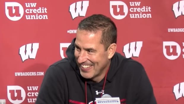 Wisconsin head coach Luke Fickell smiling during a press conference.