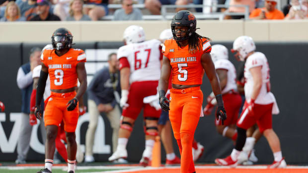 Sep 16, 2023; Stillwater, Oklahoma, USA; Oklahoma State Cowboys safety Kendal Daniels (5) and Oklahoma State Cowboys safety Trey Rucker (9) walk away after a South Alabama touchdown during an NCAA football game between Oklahoma State and South Alabama at Boone Pickens Stadium. Mandatory Credit: Bryan Terry-USA TODAY Sports
