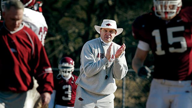 Arkansas head coach Houston Nutt gets his team motivated during practice at Brentwood Academy on Dec. 27, 2002, as they prepare for the Music City Bowl. Houston Nutt Music City Bowl.