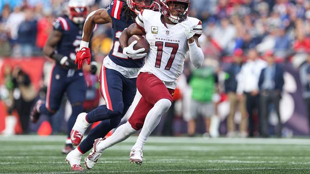 Washington Commanders receiver Terry McLaurin (17) runs the ball during the second half against the New England Patriots at Gillette Stadium.