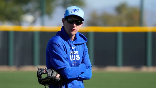Feb 16, 2024; Mesa, AZ, USA; Chicago Cubs manager Craig Counsell watches workouts during Spring Training camp at Sloan Park.