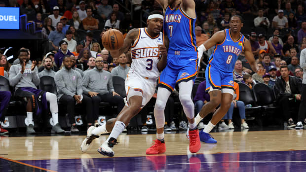 Phoenix Suns guard Bradley Beal (3) drives to the net against Oklahoma City Thunder forward Chet Holmgren (7) during the first quarter at Footprint Center.