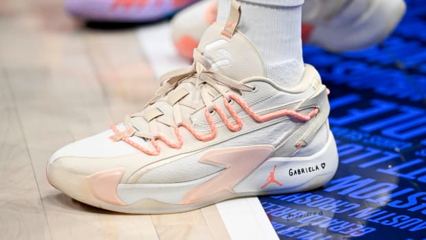 Dallas Mavericks guard Luka Doncic's pink and white Jordan Brand sneakers.