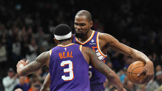 Phoenix Suns guard Bradley Beal (3) and Phoenix Suns forward Kevin Durant (35) hug during the second half of the game against the Indiana Pacers at Footprint Center. Mandatory Credit: Joe Camporeale-USA TODAY Sports