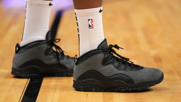 Miami Heat forward P.J. Tucker wears the Air Jordan 10 'Shadow' sneakers against the Memphis Grizzlies on December 6, 2021.