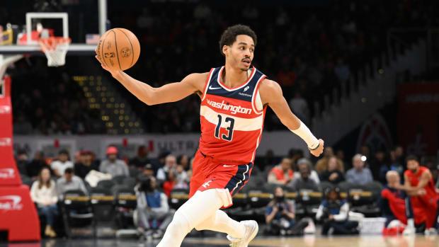 Washington Wizards guard Jordan Poole (13) brings the ball up court against the Atlanta Hawks during the second half at Capital One Arena. 