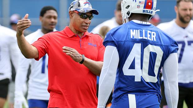 Leslie Frazier and Von Miller.