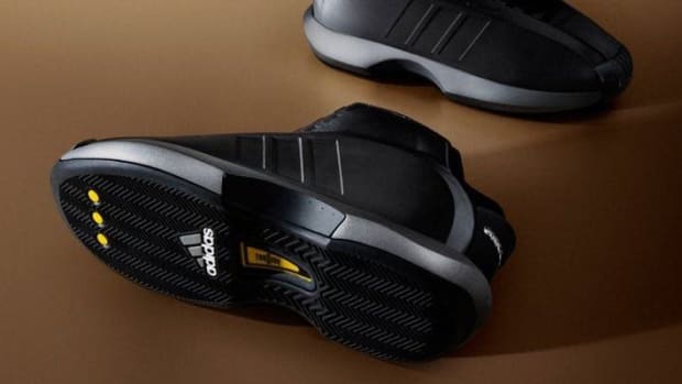 Side view of Kobe Bryant's black adidas sneakers.