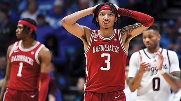 Arkansas Razorbacks guard Nick Smith Jr. reacts after being called for a foul during the second half against the Texas A&M Aggies.