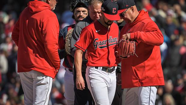 Terry Francona takes the ball from Nick Sandlin, who left Cleveland's playoff game vs. Tampa Bay with an apparent injury.