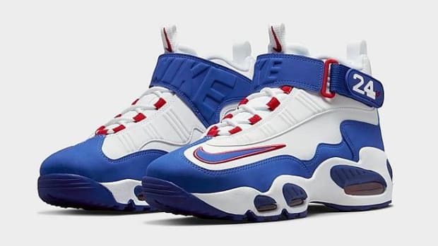 Side view of Ken Griffey's white and blue Nike shoes.