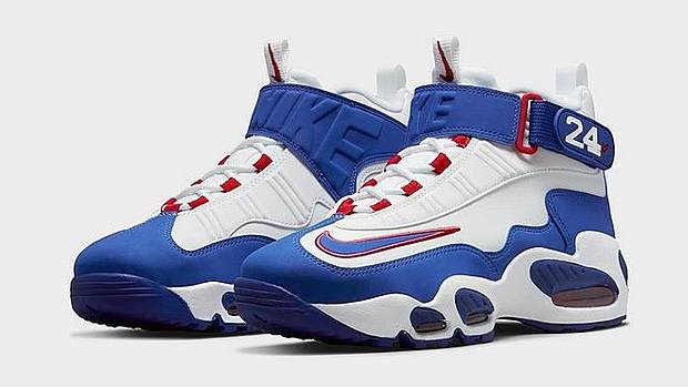 Side view of Ken Griffey's white and blue Nike shoes.