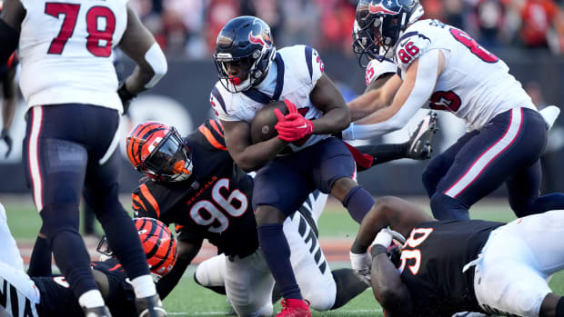 Singletary is tackled by Bengals defensive tackle DJ Reader in the fourth quarter of a Week 10 NFL football game between the Houston Texans and the Cincinnati Bengals,