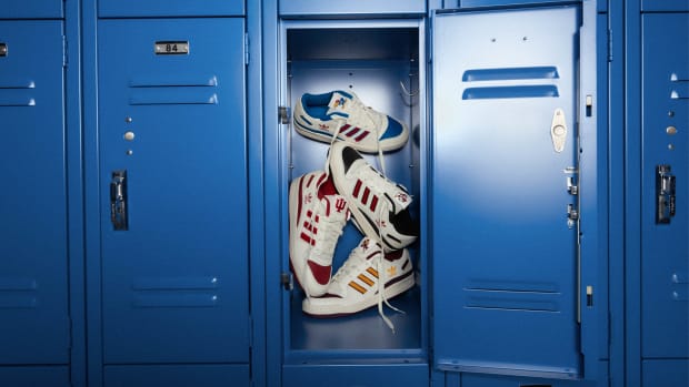 View of adidas basketball sneakers in a locker.