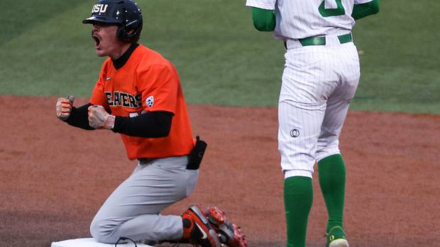 SF Giants prospect Wade Meckler celebrates after sliding into second base with Oregon State. (2022)
