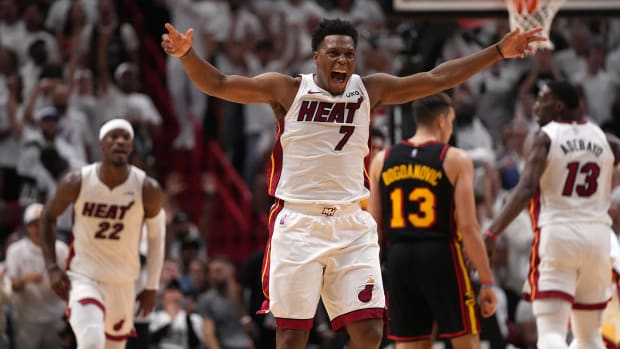 Apr 19, 2022; Miami, Florida, USA; Miami Heat guard Kyle Lowry (7) reacts after forward Jimmy Butler (22) scores in the second half of game two in the first round for the 2022 NBA playoffs against the Atlanta Hawks at FTX Arena.