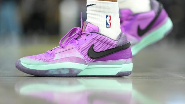 Memphis Grizzlies guard Ja Morant's purple and black Nike sneakers.