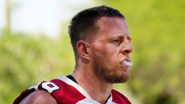 J.J. Watt standing with his mouth guard in for the Arizona Cardinals