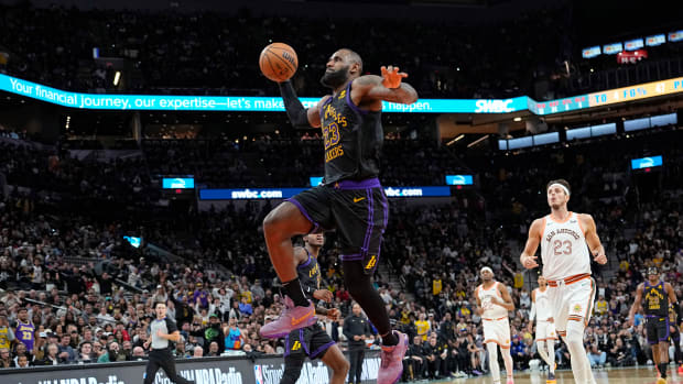 Dec 15, 2023; San Antonio, Texas, USA; Los Angeles Lakers guard LeBron James (23) goes up for a dunk during the second half against the San Antonio Spurs at Frost Bank Center.