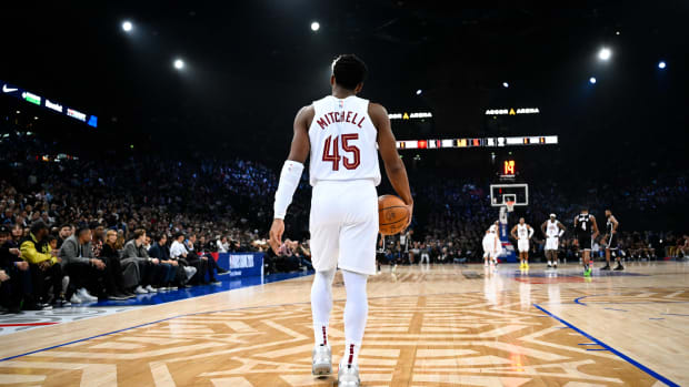 Jan 11, 2024; Paris, FRANCE; Cleveland Cavaliers guard Donovan Mitchell (45) controls the ball against the Brooklyn Nets in the NBA Paris Game at AccorHotels Arena. Mandatory Credit: Alexis Reau/Presse Sports via USA TODAY Sports