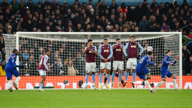Enzo Fernandez (no.8) pictured shooting from a free-kick to score a brilliant goal for Chelsea against Aston Villa in February 2024