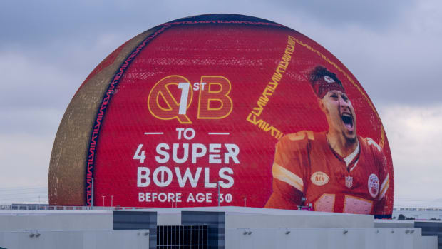 Kansas City Chiefs quarterback Patrick Mahomes is displayed on Super Bowl LVIII signage on The Sphere.