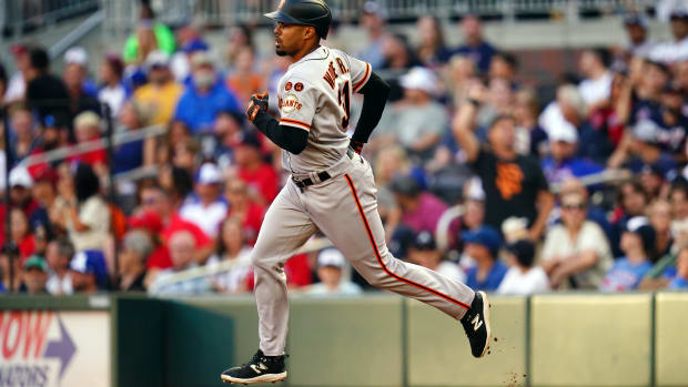 SF Giants first baseman LaMonte Wade Jr. rounds the bases on his solo homer against the Atlanta Braves during the first inning at Truist Park on August 19, 2023.