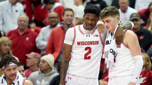 Jan 6, 2024; Madison, Wisconsin, USA; Wisconsin Badgers guard AJ Storr (2) and Wisconsin Badgers guard Connor Essegian (3) look on as the Wisconsin Badgers take on the Nebraska Cornhuskers during the second half at the Kohl Center.