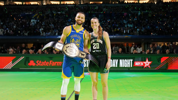 Stephen Curry and Sabrina Ionescu after the three-point challenge.