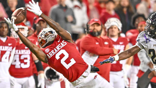 Razorbacks Andrew Armstrong makes a catch against Florida International