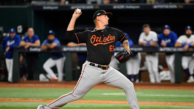 Oct 10, 2023; Arlington, Texas, USA; Baltimore Orioles relief pitcher Tyler Wells (68) pitches in the third inning against the Texas Rangers during game three of the ALDS for the 2023 MLB playoffs at Globe Life Field. Mandatory Credit: Jerome Miron-USA TODAY Sports  