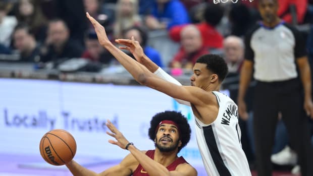 Jan 7, 2024; Cleveland, Ohio, USA; Cleveland Cavaliers center Jarrett Allen (31) looks to shoot beside San Antonio Spurs center Victor Wembanyama (1) in the first quarter at Rocket Mortgage FieldHouse.