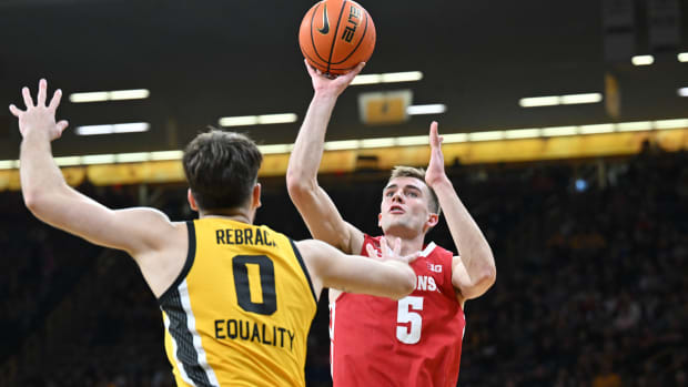 Wisconsin forward Tyler Wahl shooting a floater against Iowa.