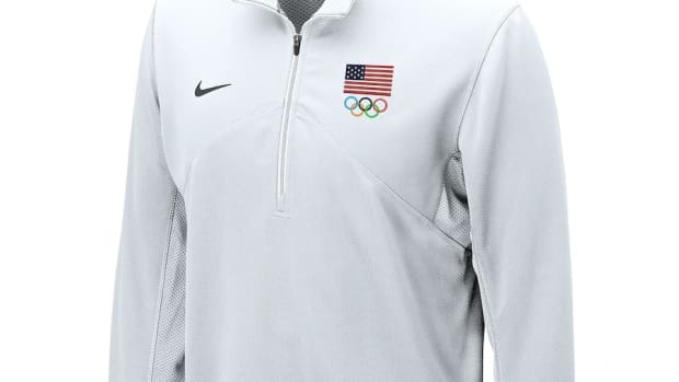 A white Team USA Nike quarter-zip shirt.