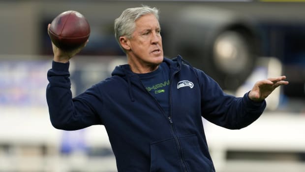 NFL: Seattle Seahawks at Los Angeles Rams Dec 21, 2021; Inglewood, California, USA; Seattle Seahawks head coach Pete Carroll throws the ball before the game against the Los Angeles Rams at SoFi Stadium.