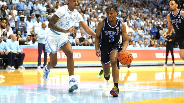 Duke Blue Devils guard Jeremy Roach dribbles past North Carolina Tar Heels forward Armando Bacot.