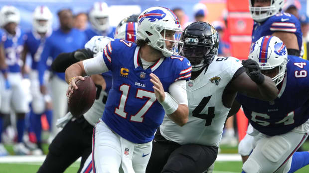 Bills quarterback Josh Allen feels the Jaguars pressure during Sunday's game.