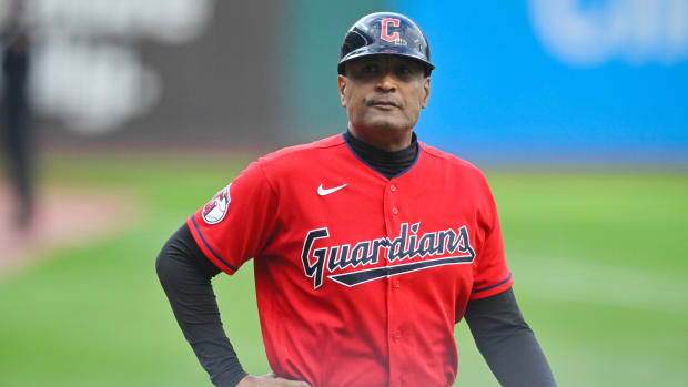 Sep 13, 2022; Cleveland, Ohio, USA; Cleveland Guardians first base coach Sandy Alomar Jr. (15) stands on the field in the first inning against the Los Angeles Angels at Progressive Field. Mandatory Credit: David Richard-USA TODAY Sports