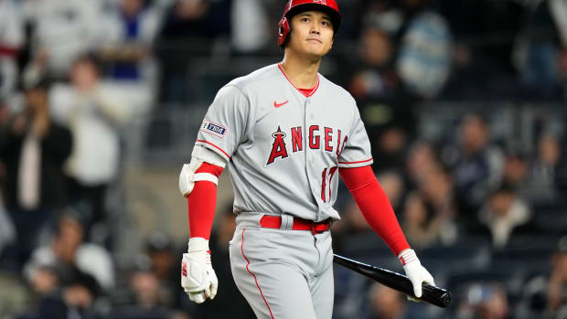 Shohei Ohtani reacts after striking out during the seventh inning of a game against the Yankees in New York.