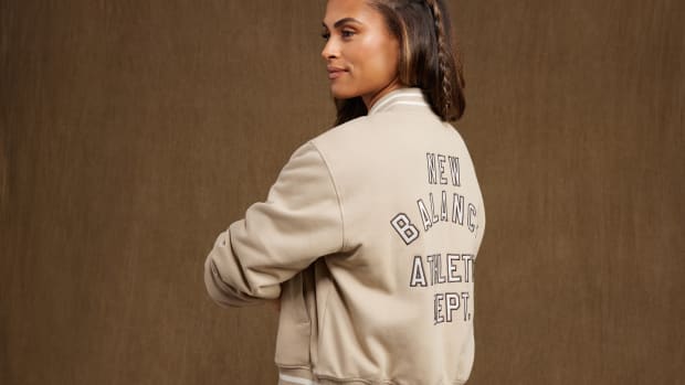 Sydney McLaughlin-Levrone models a New Balance jacket.