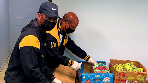 Volunteers at the St. James Missionary Baptist Church outreach center sort through donated items to be distributed to the local community. This weekend, they will partner with BYU as part of a massive effort to fill the pantry that feeds thousands of Arkansans each week.
