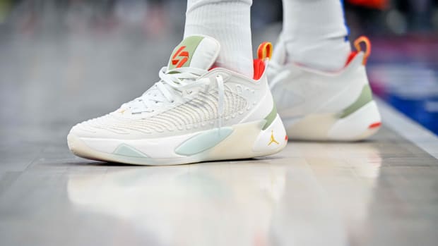 View of white and red Jordan Luka shoes.