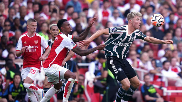 Rasmus Hojlund pictured (right) battling for the ball with Arsenal defender Gabriel during Manchester United's 3-1 defeat at the Emirates Stadium in September 2023