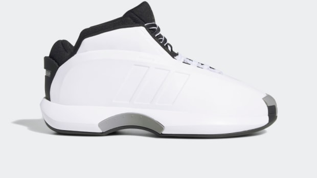 View of white and black adidas shoe.
