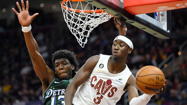 Mar 4, 2023; Cleveland, Ohio, USA; Cleveland Cavaliers guard Caris LeVert (3) passes beside Detroit Pistons guard James Wiseman (13) in the third quarter at Rocket Mortgage FieldHouse. Mandatory Credit: David Richard-USA TODAY Sports
