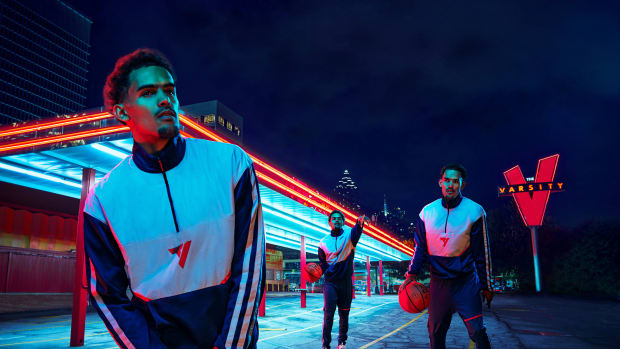 Multiple Trae Young's posing in Adidas clothing.