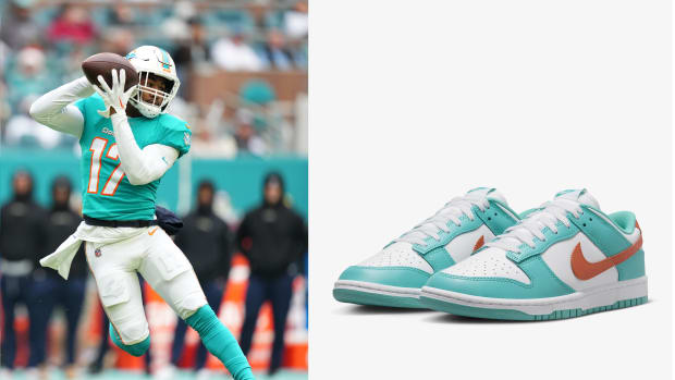 Miami Dolphins wide receiver Jaylen Waddle next to teal and orange Nike sneakers.